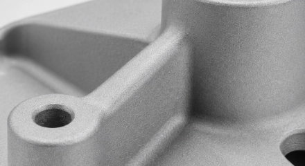 Bead blasted matte finish on a precision machined component